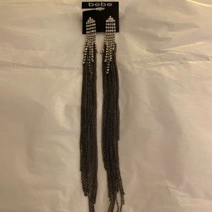 BEBE RARE, NWT Fringe duster earrings 12” long.
